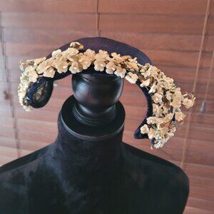 Vintage 1950s Navy blue straw hat with white flowers and navy blue velvet trim